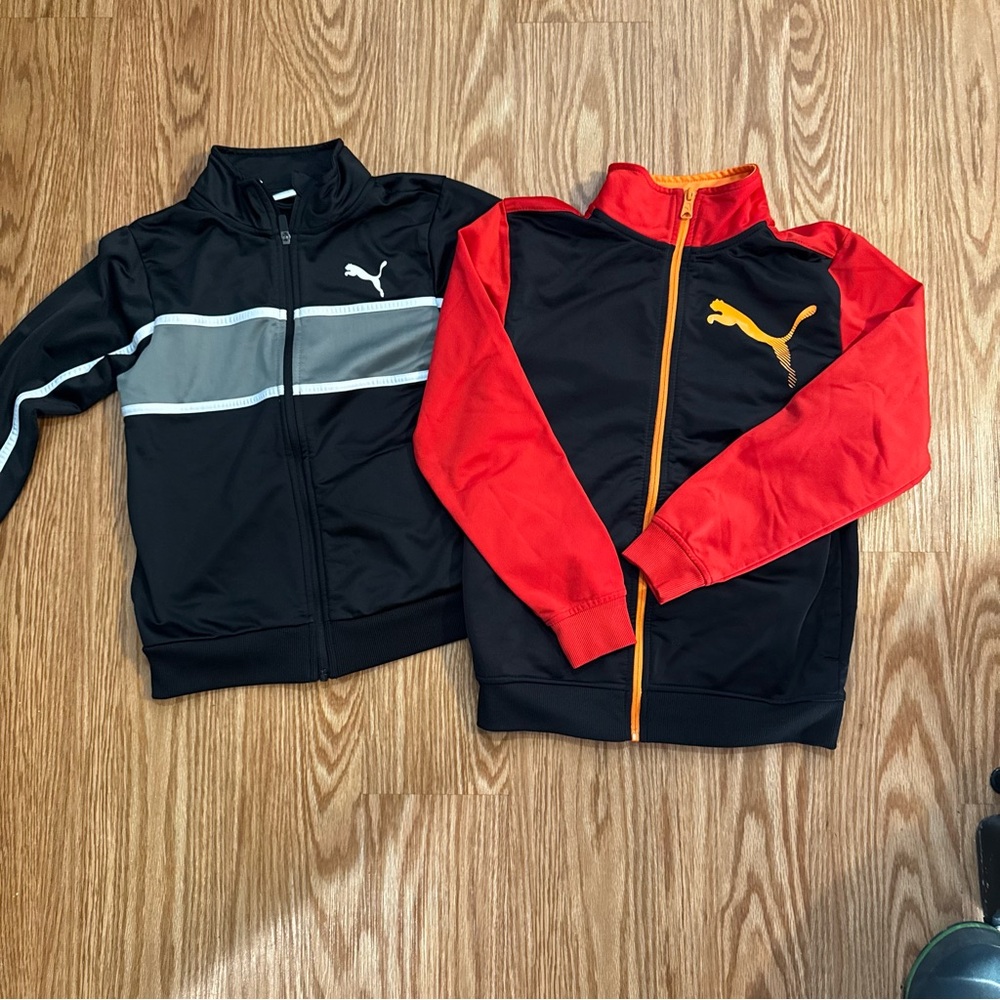Puma Kids' Black and Red Jackets with Gray and Orange Accents